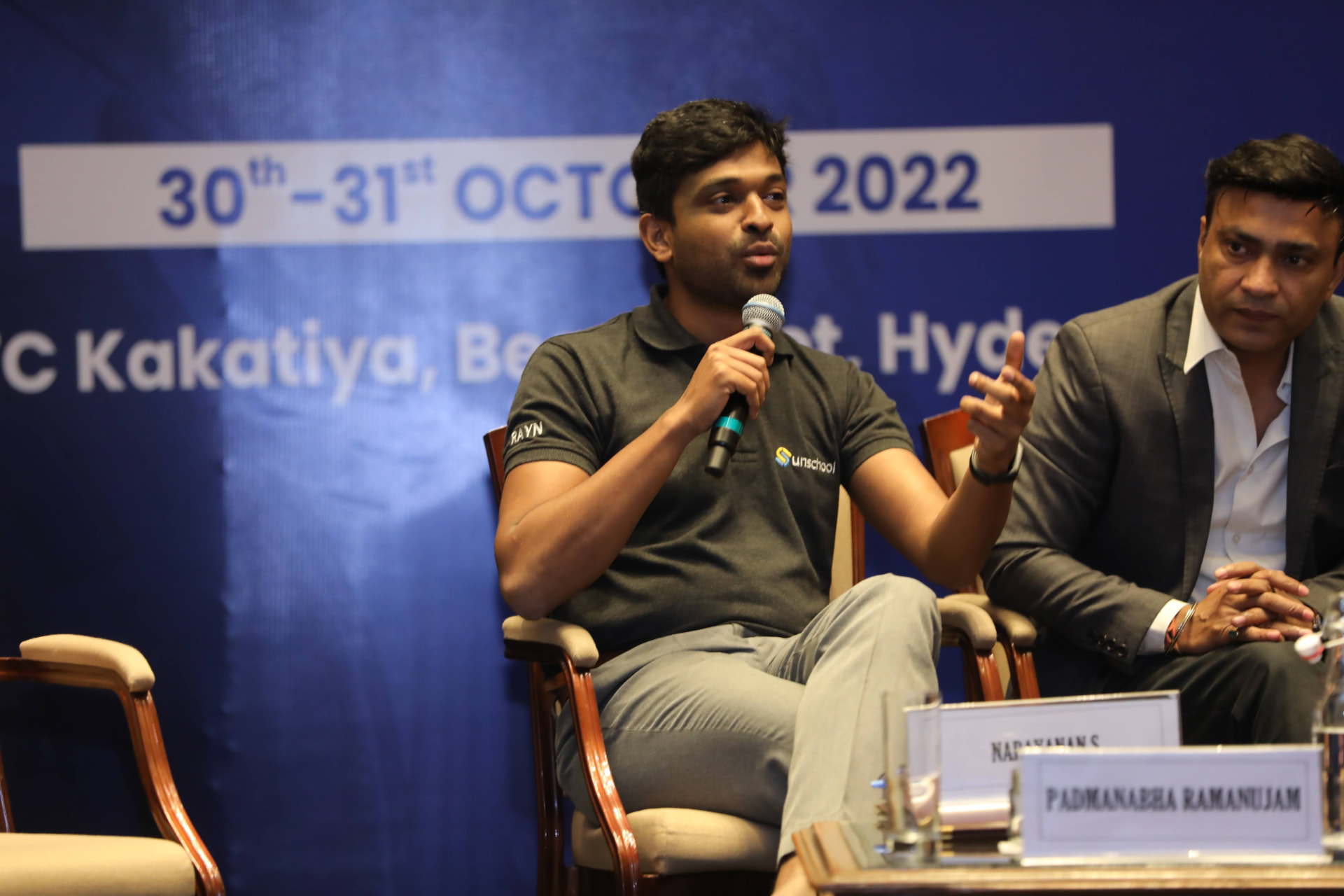 Narayanan speaking on a panel at a conference in Hyderabad, 2022