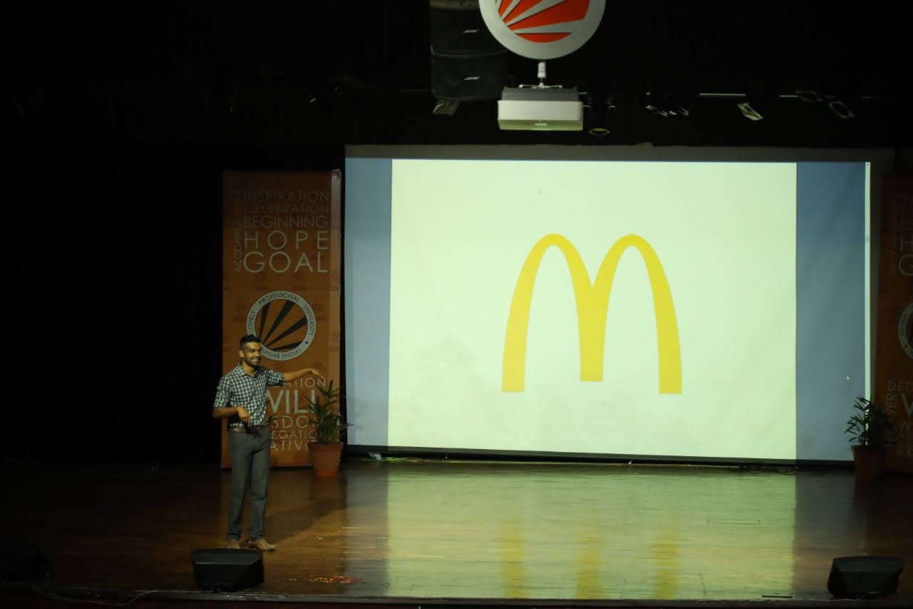 Narayanan on stage delivering a keynote to a university audience